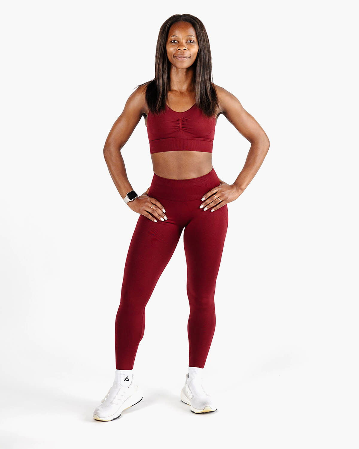 Full body shot of the High Support Red Bra and Leggings, engineered with Swiss-inspired precision for durability and elegance.