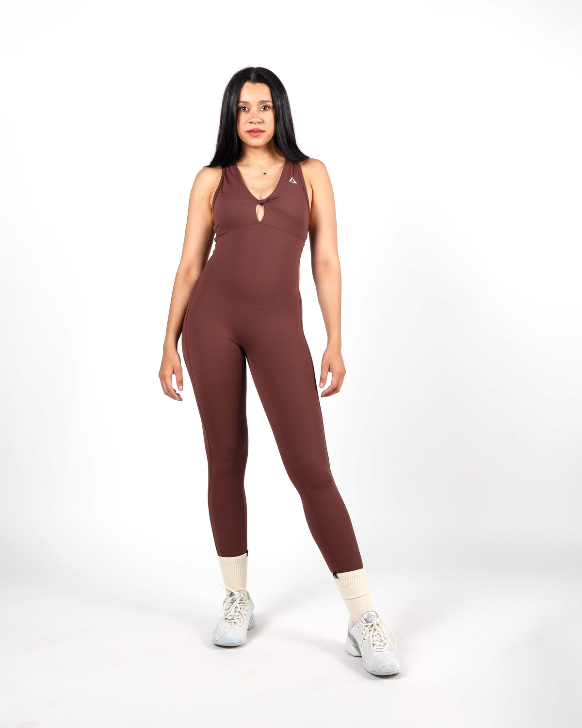 Plum Dellaura Blossom O-ring sculpting bodysuit made with 78% nylon and 22% elastane fabric for compression and high-intensity workouts.