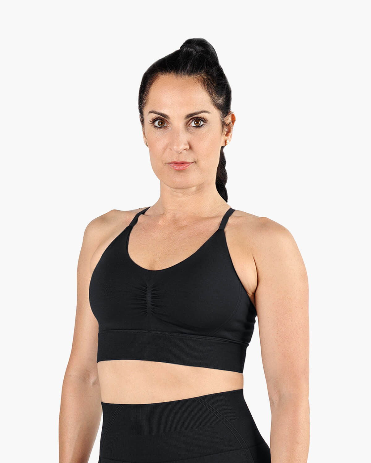 Close-up of black front scrunch detail on Dellaura sports bra.