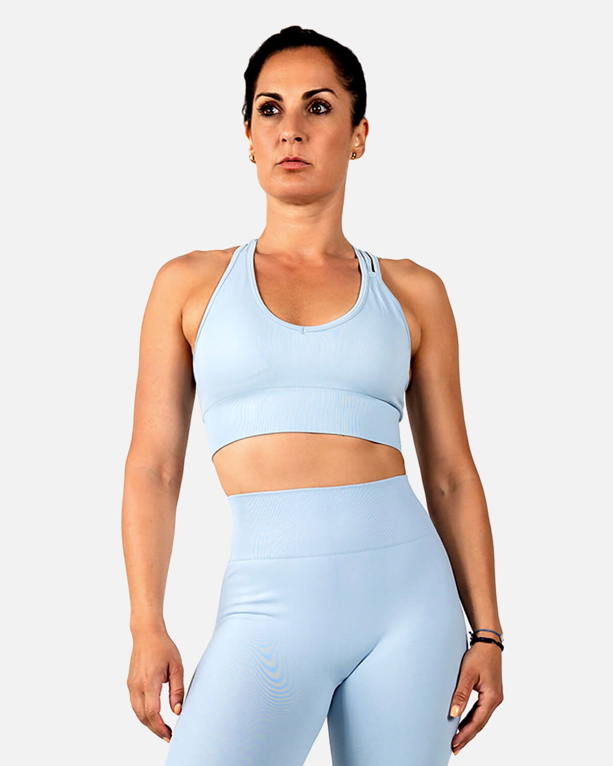 Front view of the Seamless Sculpfit High-Support Sports Bra in Sky Blue, designed for unwavering support and zero distraction during HIIT workouts.